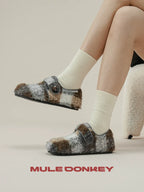 Donkey Contrasts Colors and Lazes in Mueller Shoes