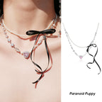 PP Streamer Bow Pearl Love Necklace
