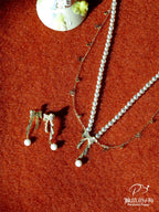 PP Bow Pearl Fringed Necklace