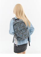 CryingCenter Blue Leopard Backpack Brown leather leopard print bag